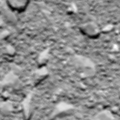 La última imagen enviada por Rosetta. Desenfocada, a 51 metros de altura de la superficie del cometa donde se ha estrellado.