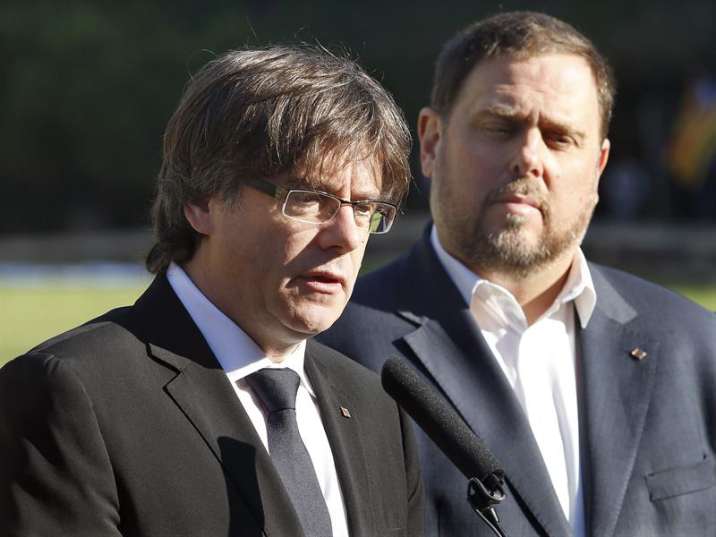 Carles Puigdemont y Oriol Junqueras.