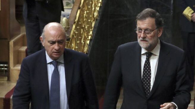 Jorge Fernández Díaz y Mariano Rajoy, en el Congreso.