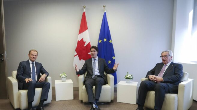 Donald Tusk, Trudeau y Jean Claude Juncker.
