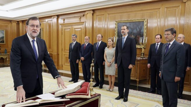 El Rey, Rajoy y altos cargos celebran el final de una etapa difícil "para todos"