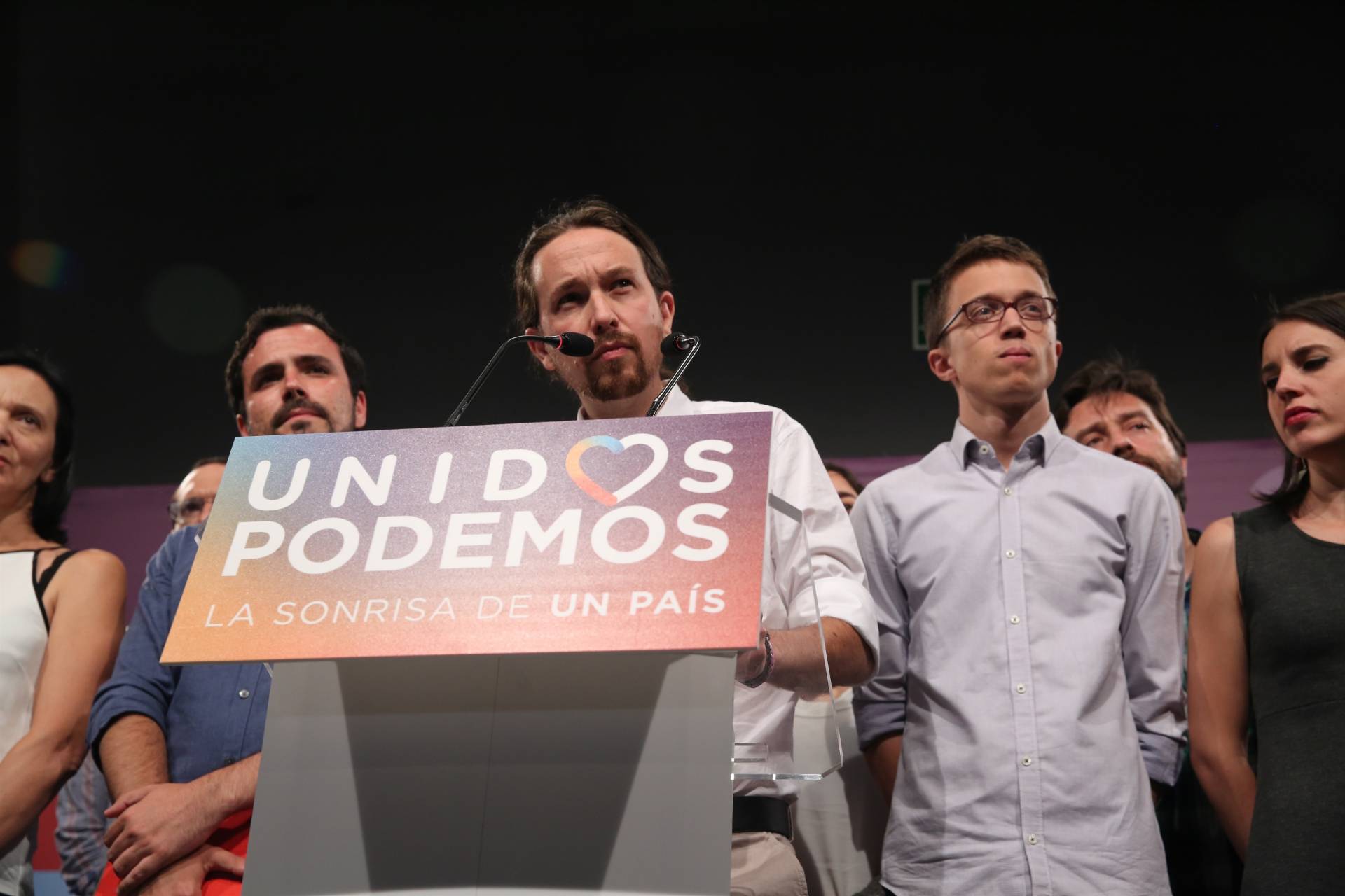 Alberto Garzón, Pablo Iglesias e Iñigo Errejón, en un acto de Podemos.