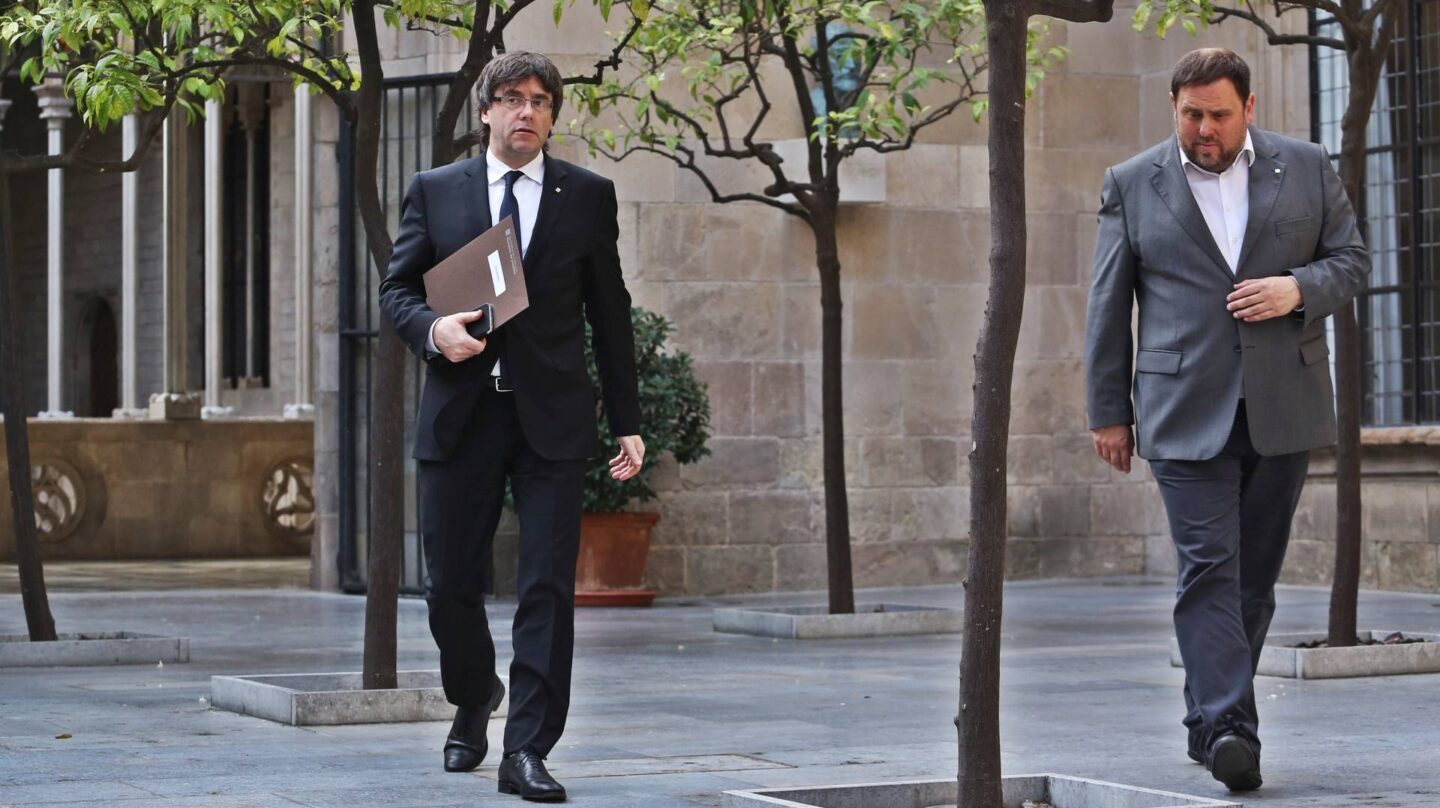 El presidente y el vicepresidente de la Generalitat de Cataluña, Carles Puigdemont y Oriol Junqueras.