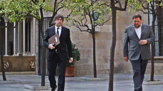 El presidente y el vicepresidente de la Generalitat de Cataluña, Carles Puigdemont y Oriol Junqueras.