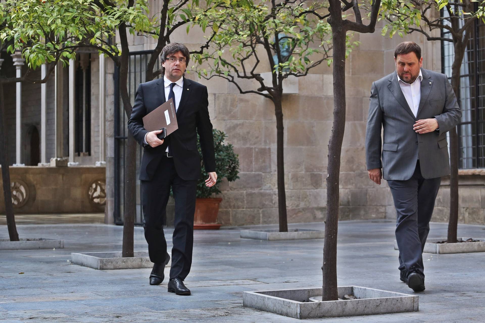 El presidente y el vicepresidente de la Generalitat de Cataluña, Carles Puigdemont y Oriol Junqueras.