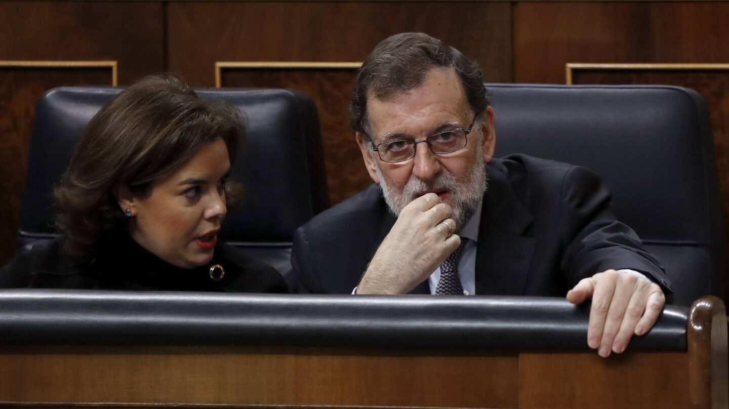 Soraya Sáenz de Santamaría y Mariano Rajoy.