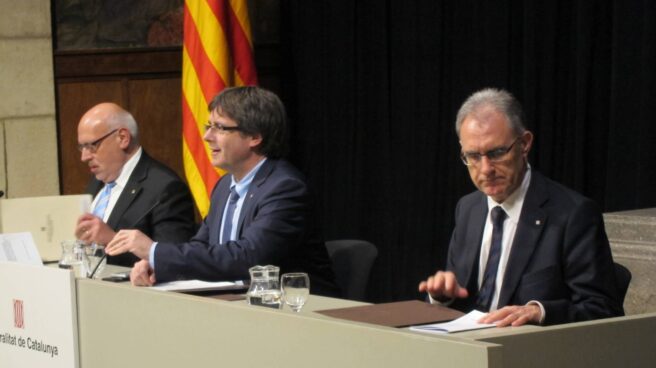 Jordi Baiget, Carles Puigdemont y Xavier Gibert.