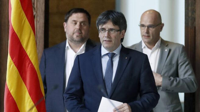 Puigdemont, con Junqueras y Romeva. Puigdemont, con Junqueras y Romeva.