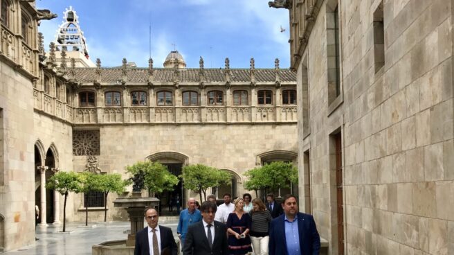 Turull, Puigdemont y Junqueras, en el Palau de la Generalitat.