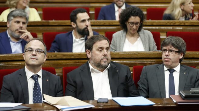 Turull, Junqueras y Puigdemont, en el Parlament.