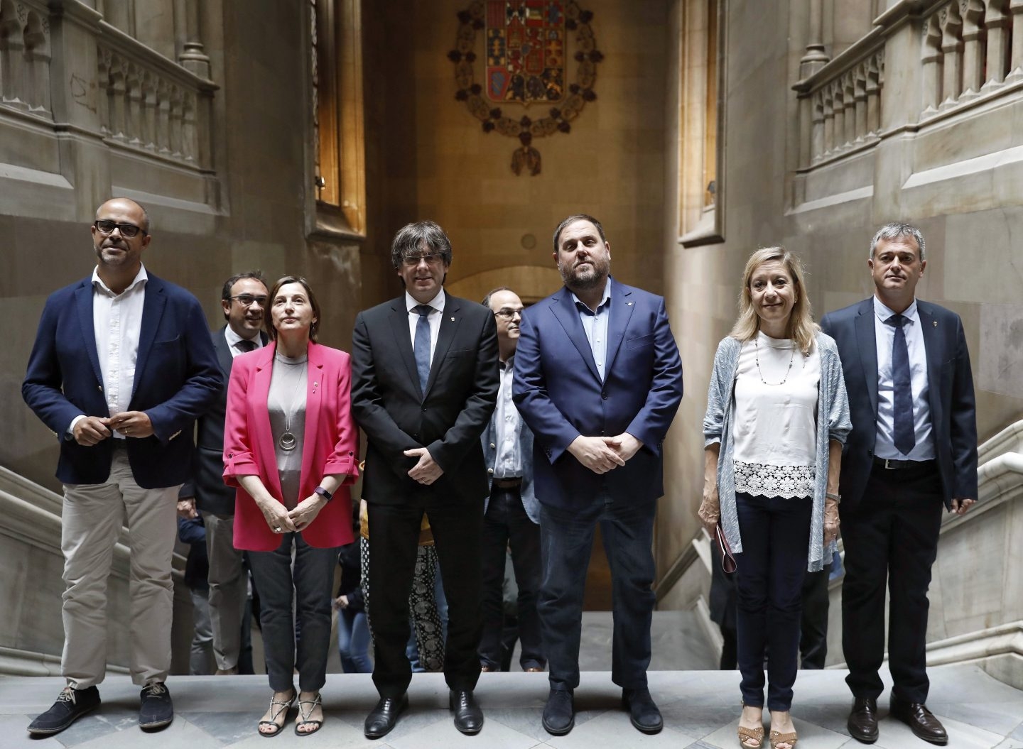 Carles Puigdemont y Oriol Junqueras, antes de la reunión con la AMI.