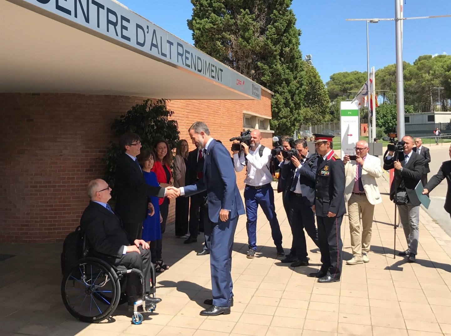 El Rey reivindica la unidad olímpica y Puigdemont el reconocimiento del catalán