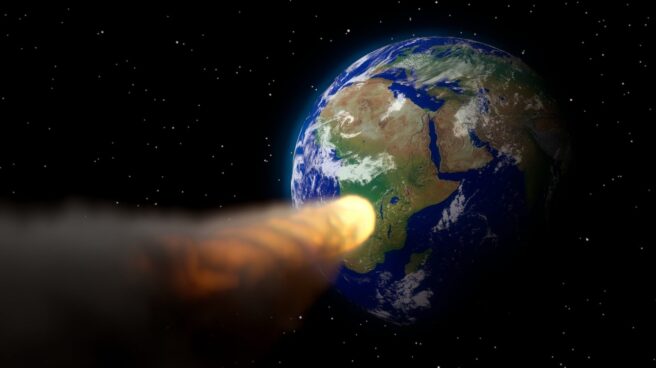 Simulación un asteroide como el que acabó con los dinosauiros cayendo sobre la Tierra.