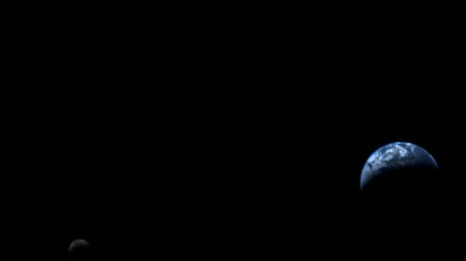 La primera foto de la tierra y la luna desde el espacio