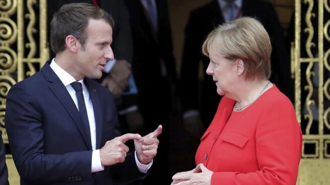 El presidente francés, Emmanuel Macron, y la canciller alemana, Angela Merkel, esta semana en la Feria de Fráncfort.