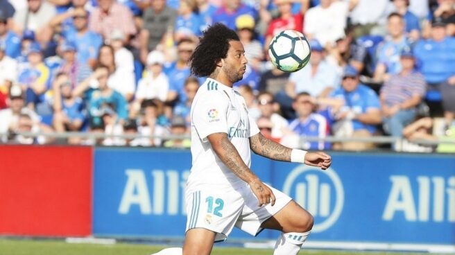 Marcelo, jugador del Real Madrid investigado por elusión fiscal, durante un partido de fútbol.
