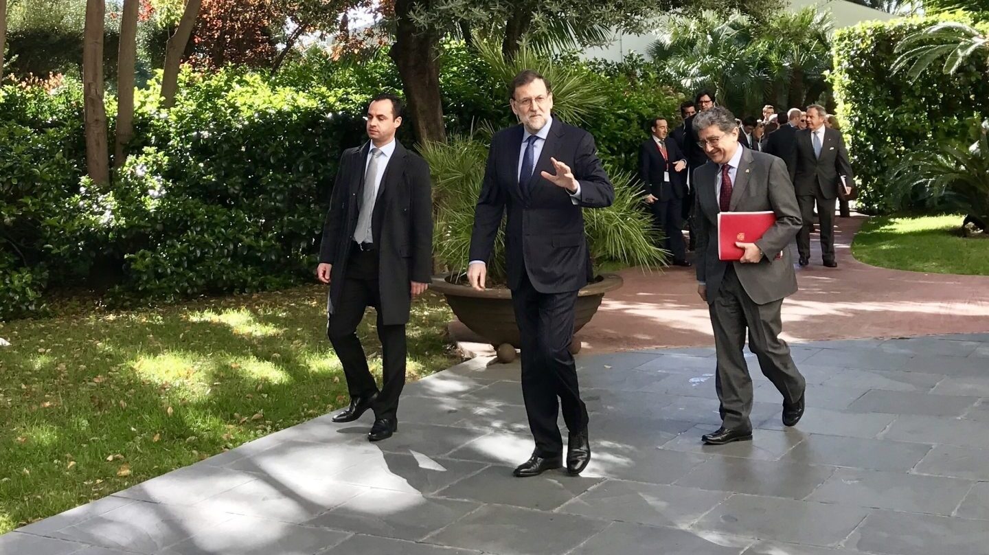 El presidente del Gobierno, Mariano Rajoy, junto al delegado del Gobierno en Cataluña, Enric Millo.
