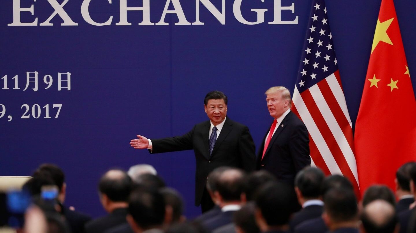 El líder chino, Xi Jinping, junto al presidente de EEUU, Donald Trump, en el Palacio del Pueblo de Pekín.