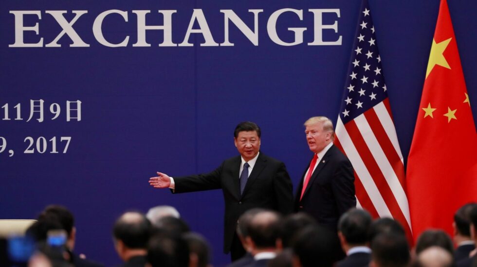 El líder chino, Xi Jinping, junto al presidente de EEUU, Donald Trump, en el Palacio del Pueblo de Pekín.