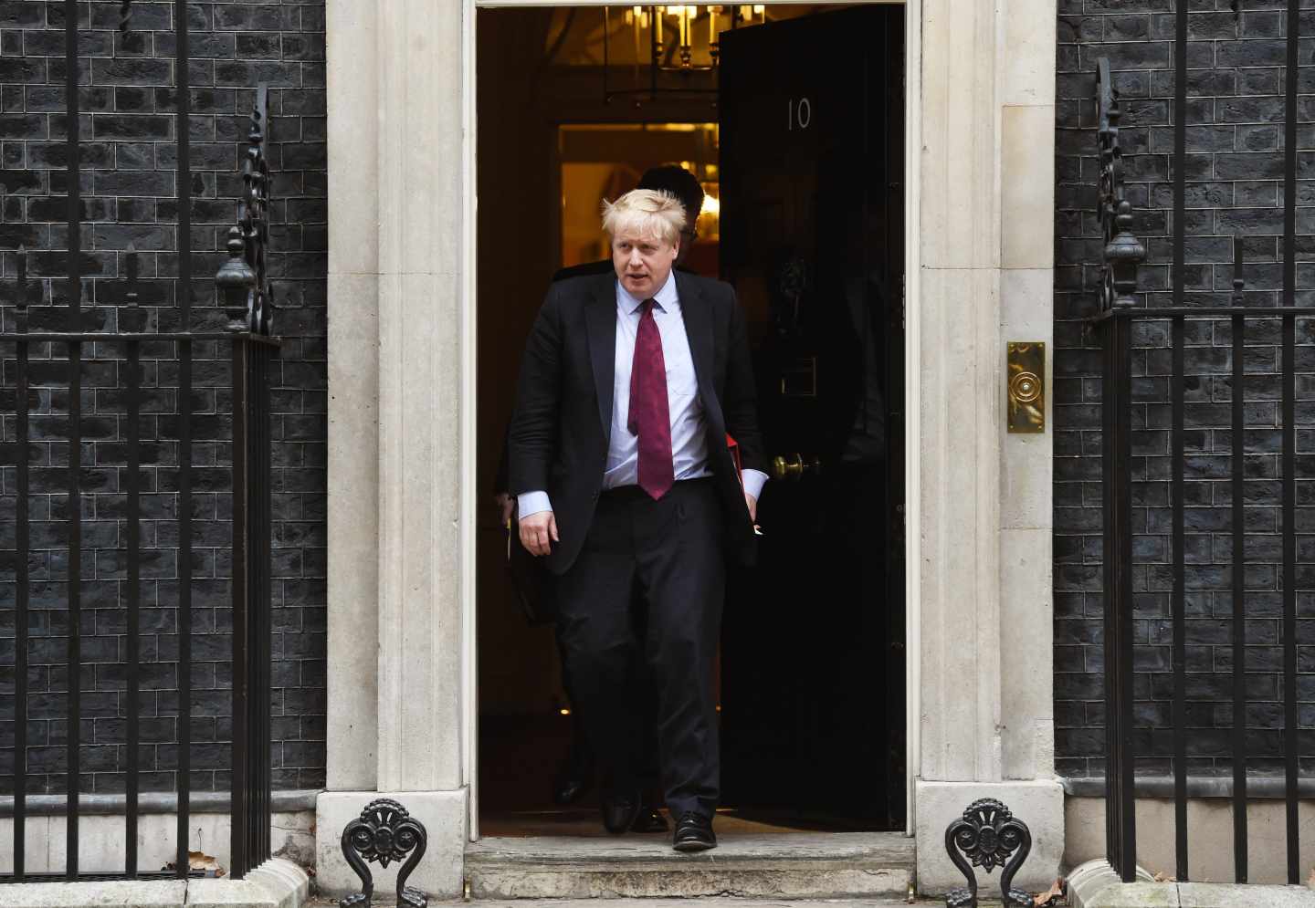 El ex ministro de Exteriores británico, Boris Johnson, tras una reunión con Theresa May.