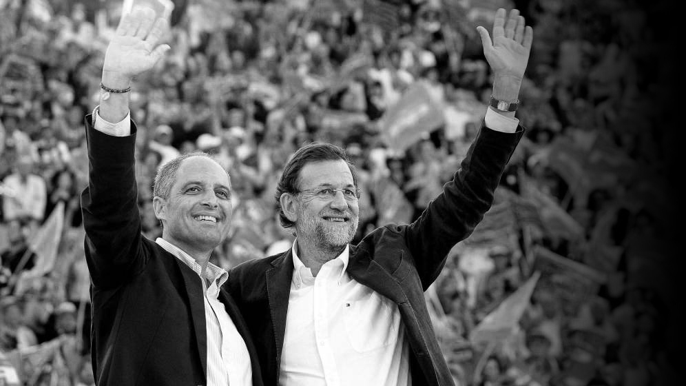 Francisco Camps y Mariano Rajoy durante un mitin en la Plaza de Toros de Valencia en 2011.
