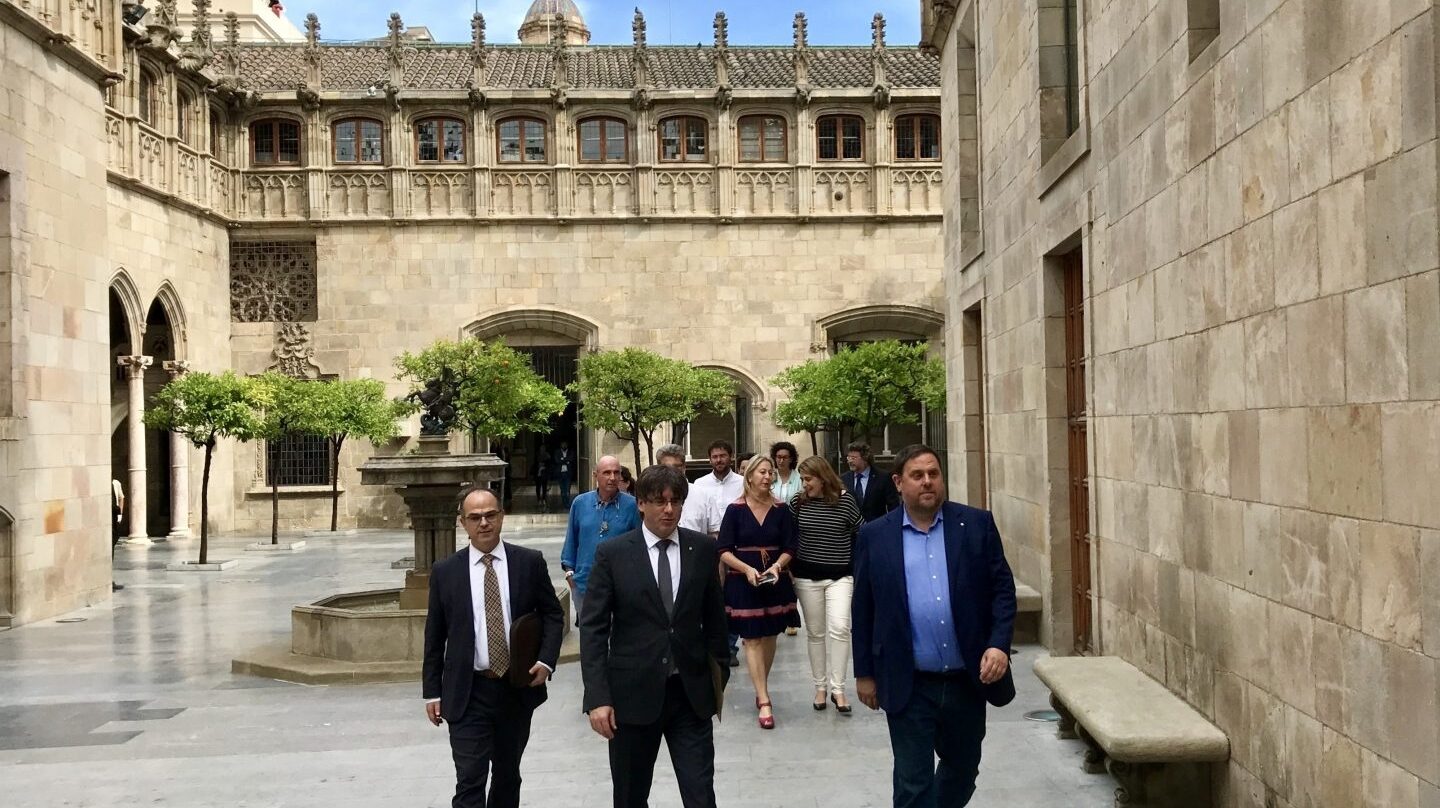 Jordi Turull, Carles Puigdemont y Oriol Junqueras.