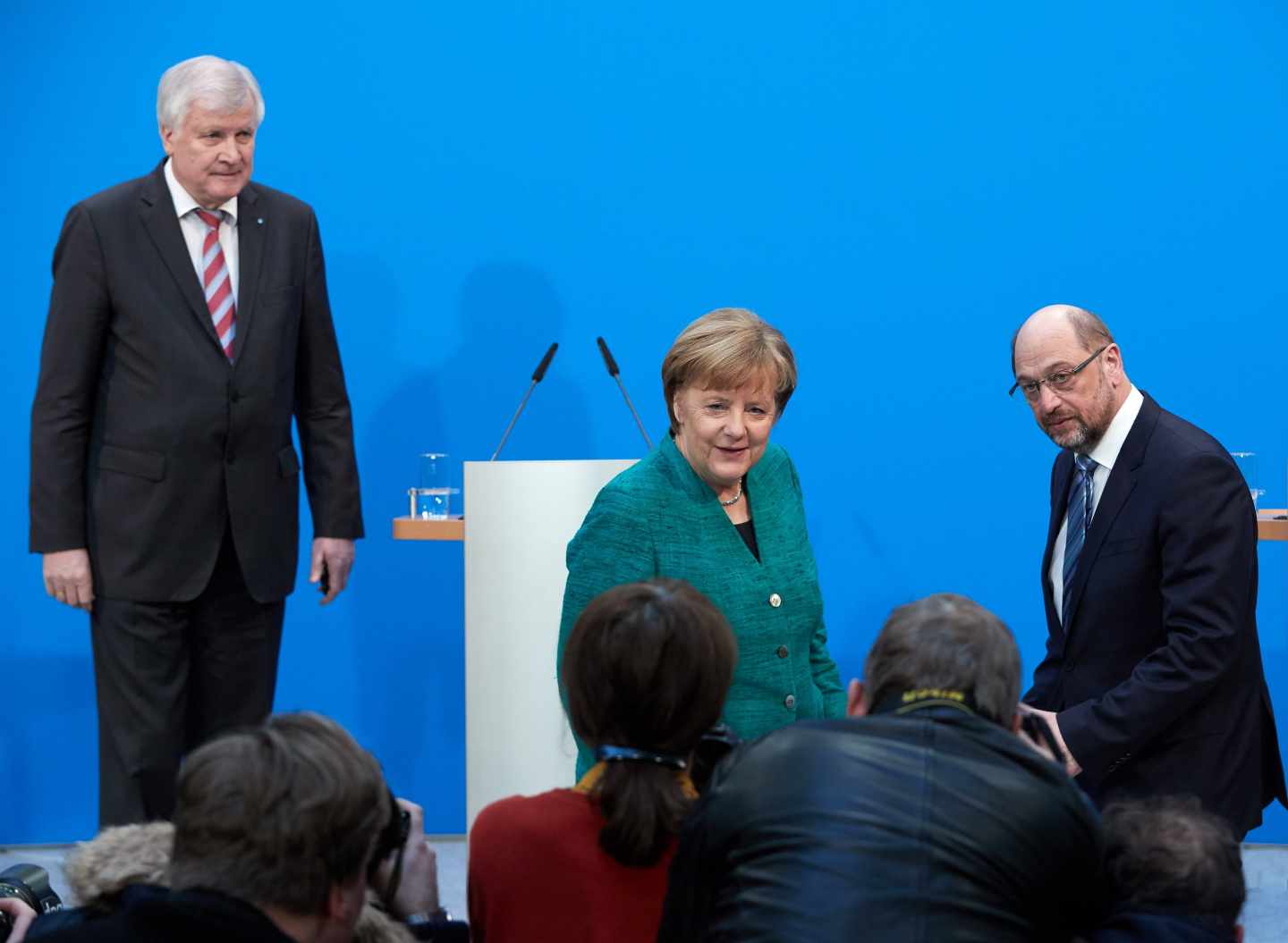 Los tres líderes de la gran coalición alemana, en su rueda de prensa en Berlin.