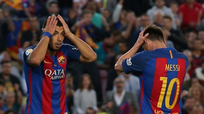 Los jugadores del FC Barcelona Luis Suárez y Leo Messi.