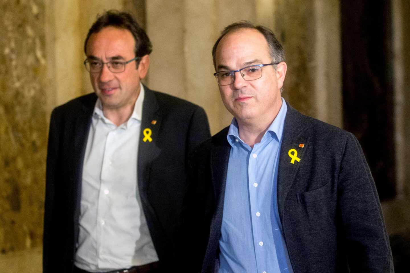 Los ex consejeros Josep Rull y Jordi Turull, en el Parlament.