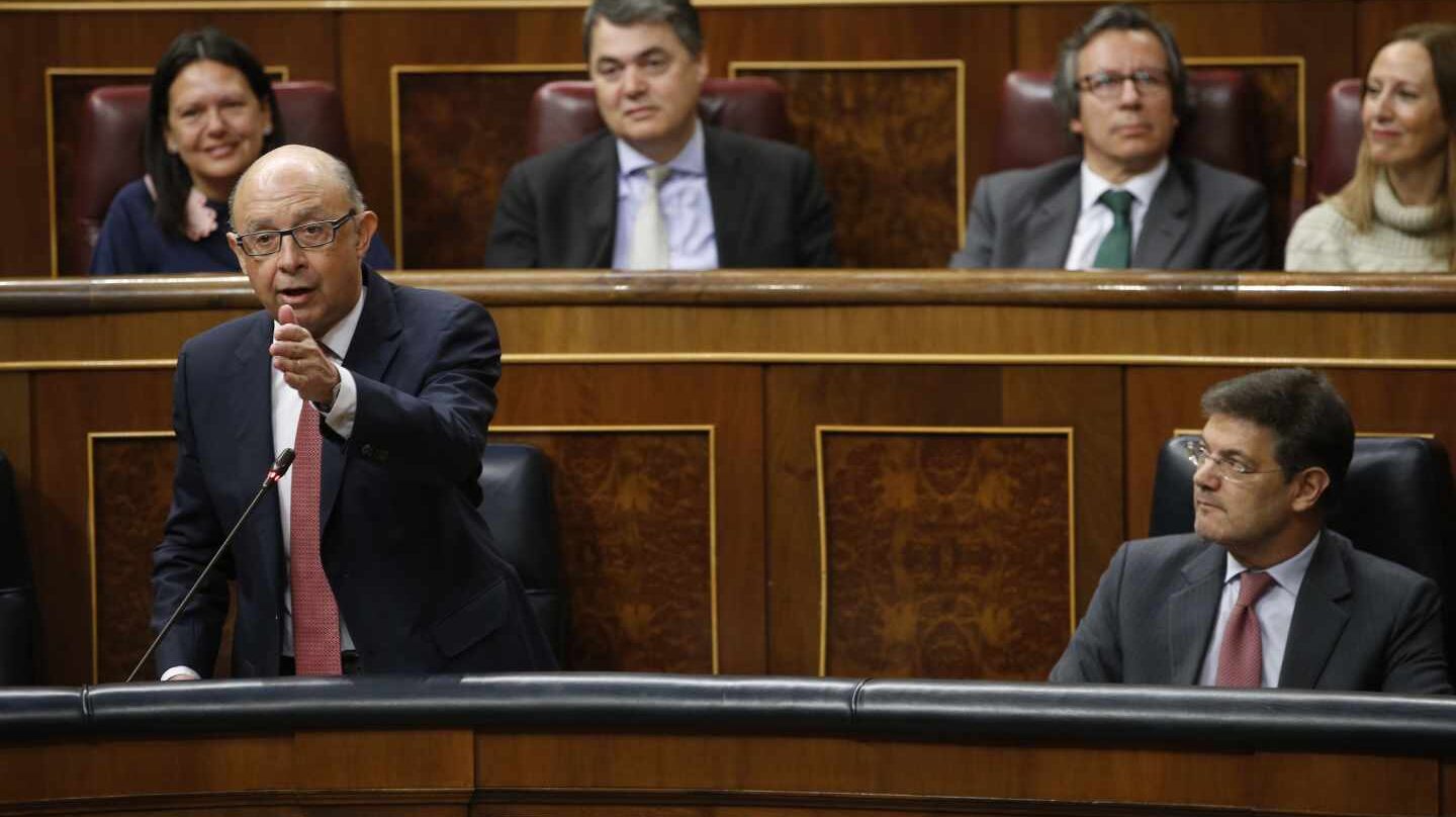Cristóbal Montoro y Rafael Catalá.