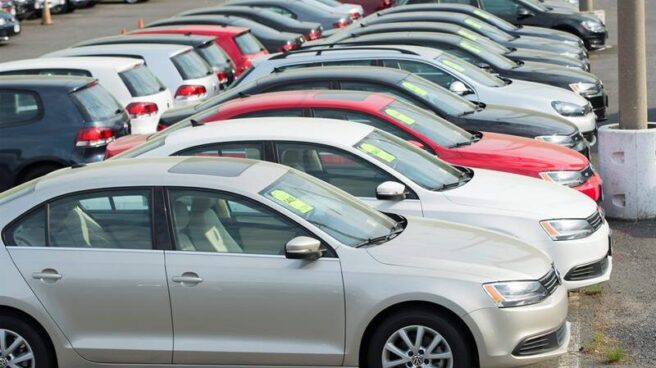 Image of various vehicles from a street dealership