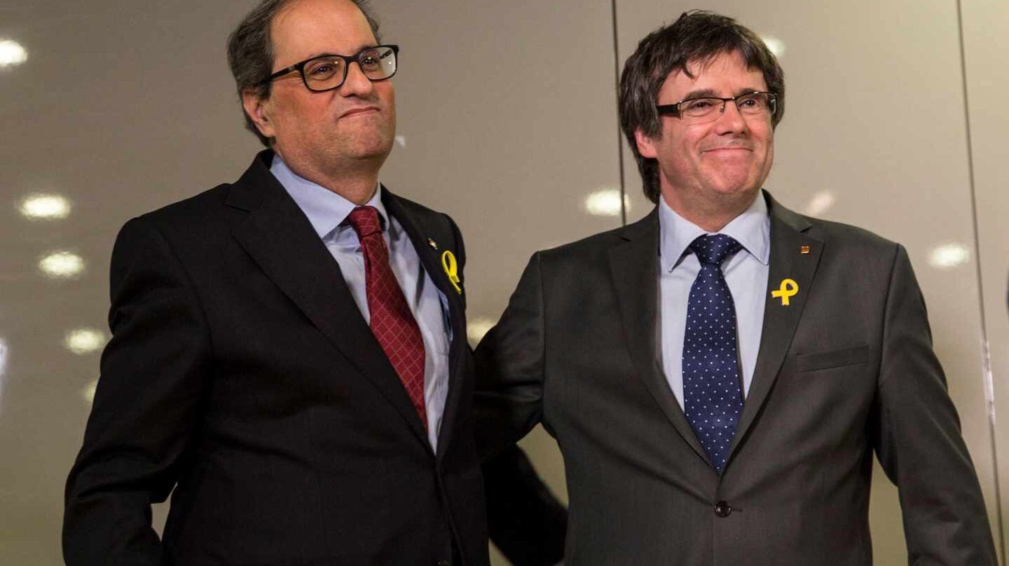 El nuevo presidente de la Generalitat, Quim Torra, junto a Carles Puigdemont en Berlín.