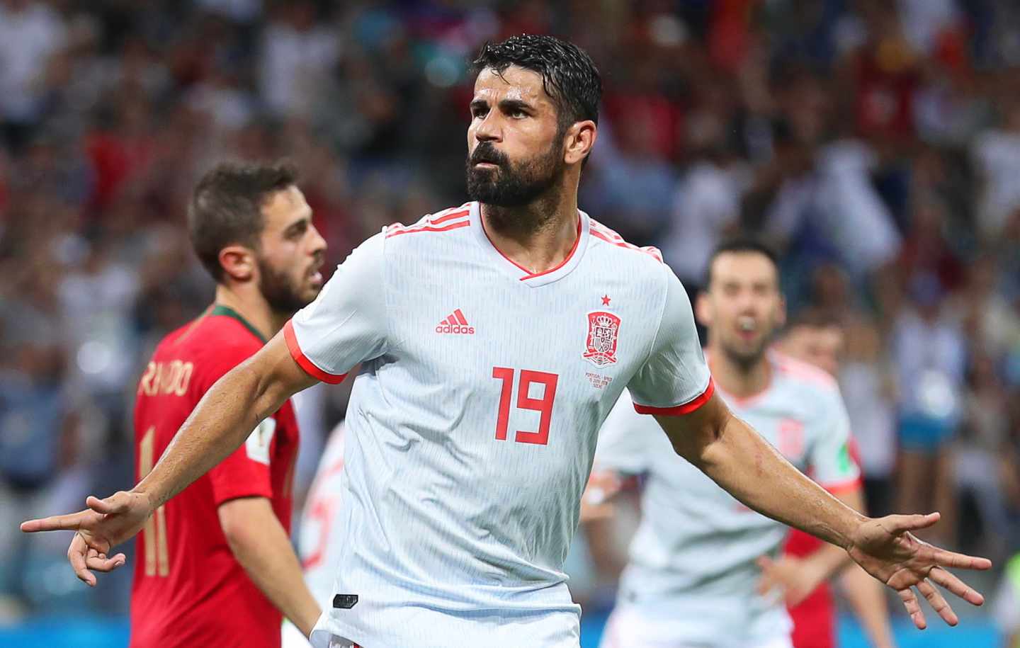 Diego Costa celebra uno de los goles a Portugal.