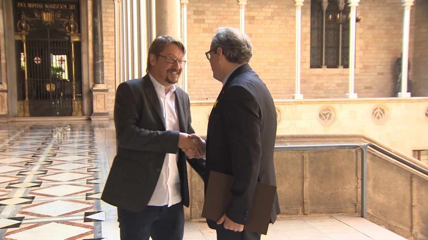 El líder de Catalunya en Comú, Xavier Domènech, junto al presidente de la Generalitat, Quim Torra.