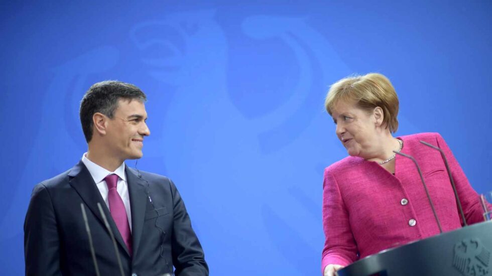 Pedro Sánchez y Angela Merkel.