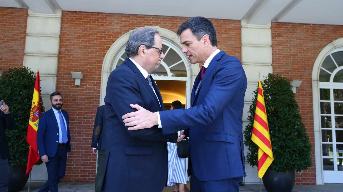 El presidente de la Generalitat, Quim Torra, junto al presidente del Gobierno hoy en funciones, Pedro Sánchez, en La Moncloa.