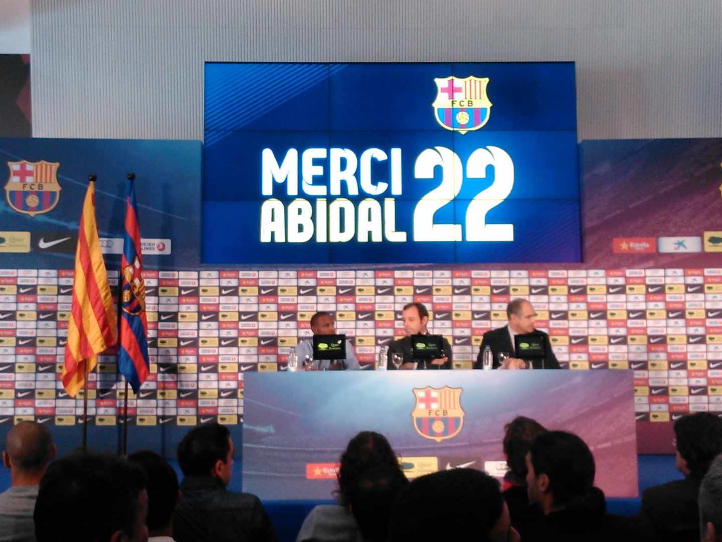 Eric Abidal y Sandro Rosell.