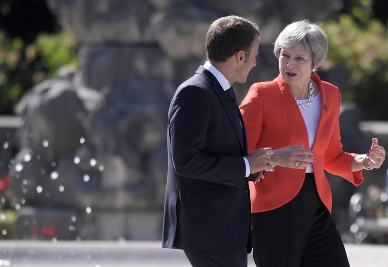 May y Macron en Salzburgo