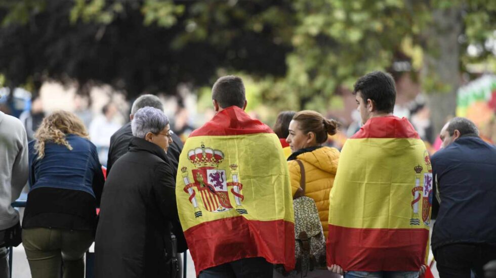 Asistentes al desfile del 12-O en la Castellana de Madrid.