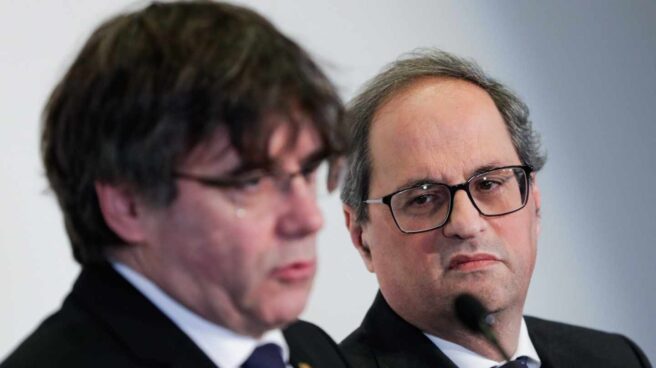 Carles Puigdemont y Quim Torra, durante una rueda de prensa en Bruselas.