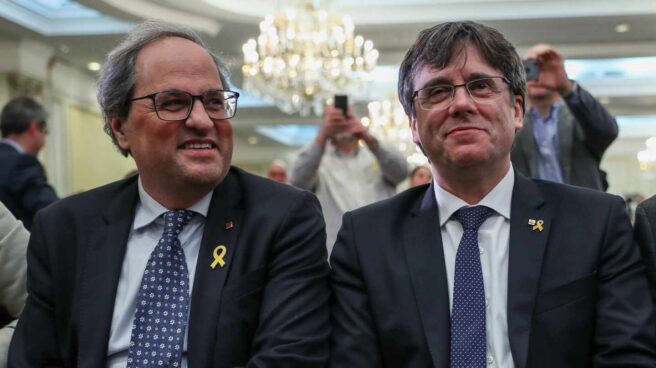 El presidente de la Generalitat de Cataluña, Quim Torra, junto a Carles Puigdemont.
