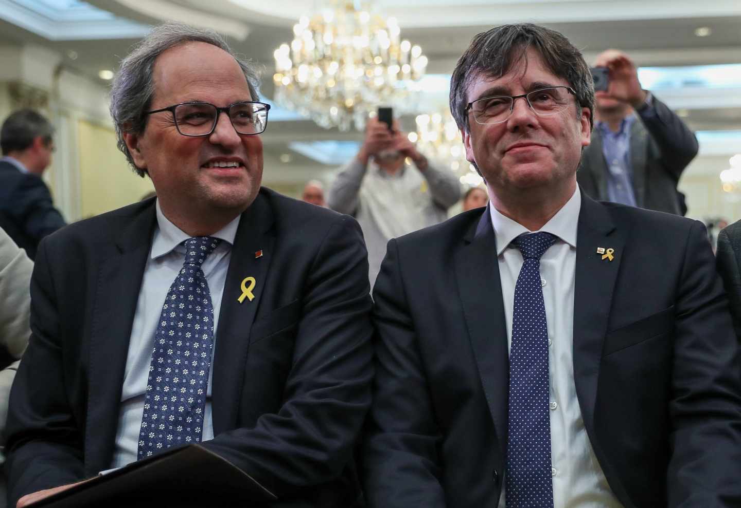 El presidente de la Generalitat de Cataluña, Quim Torra, junto a Carles Puigdemont.