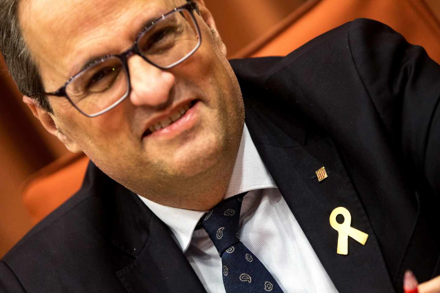 Quim Torra, con un lazo amarillo en la solapa.