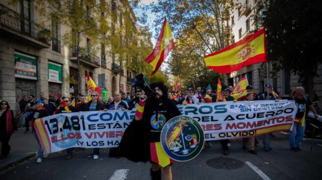 Protesta de Jusapol en demanda de la equiparación salarial en las calles de Barcelona.