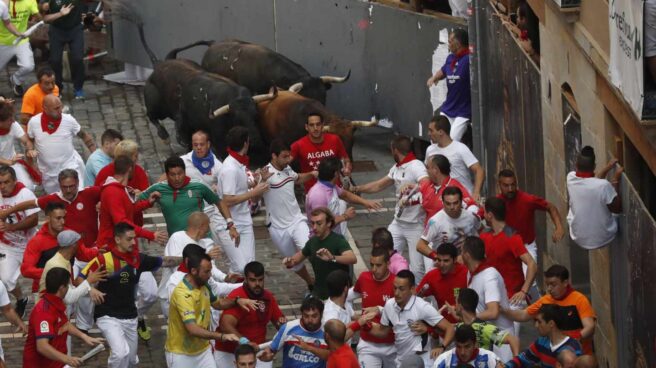 Los toros de Palmosilla en el Séptimo encierro de San Fermín.