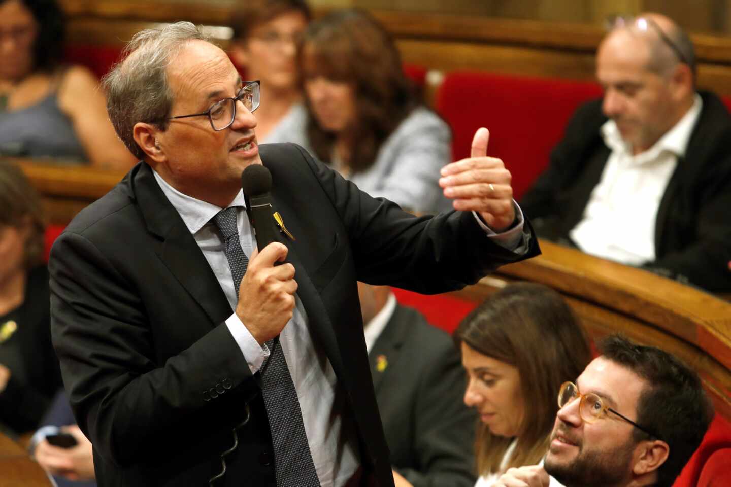 Torra promete a la CUP que estará "atento a la depuración de responsabilidades" en los Mossos