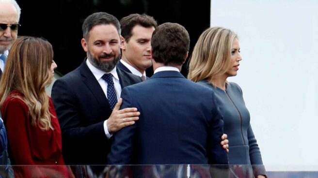 Albert Rivera, Santiago Abascal y Pablo Casado durante la Fiesta Nacional.
