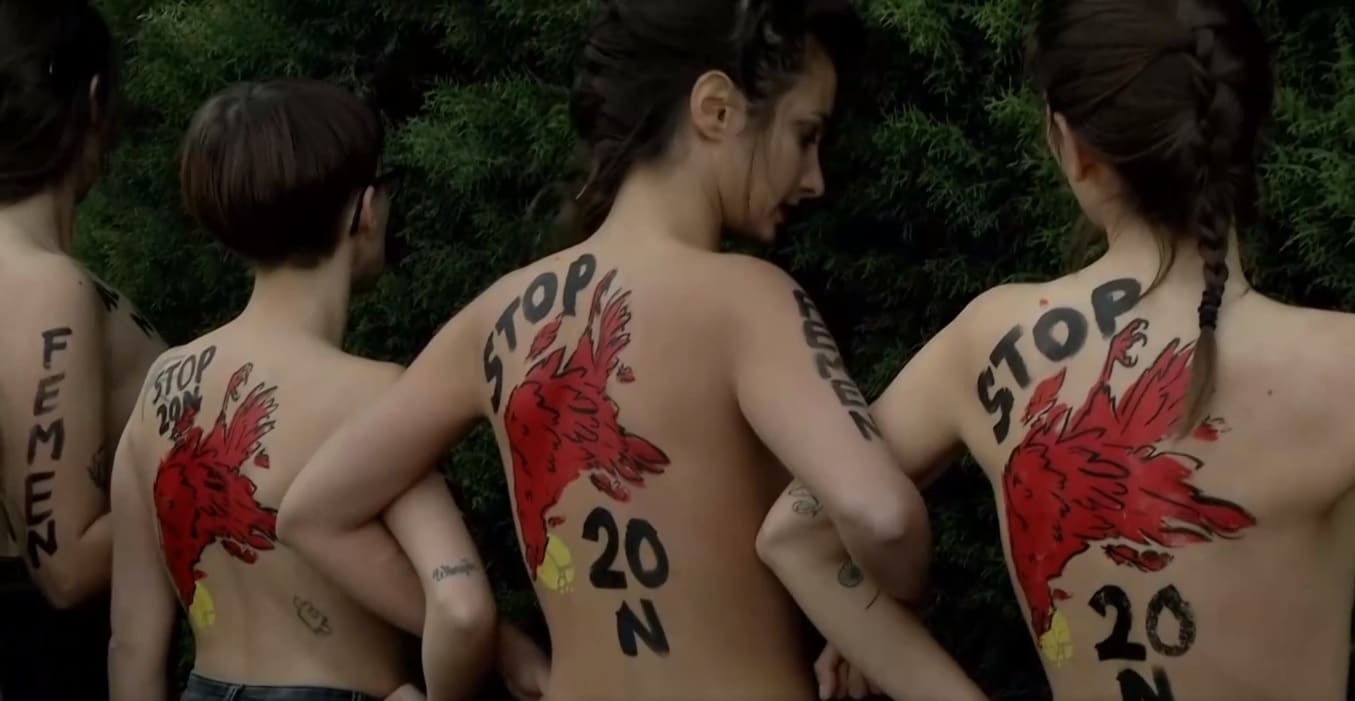 Activistas de Femen irrumpen en una marcha convocada por Falange en Madrid