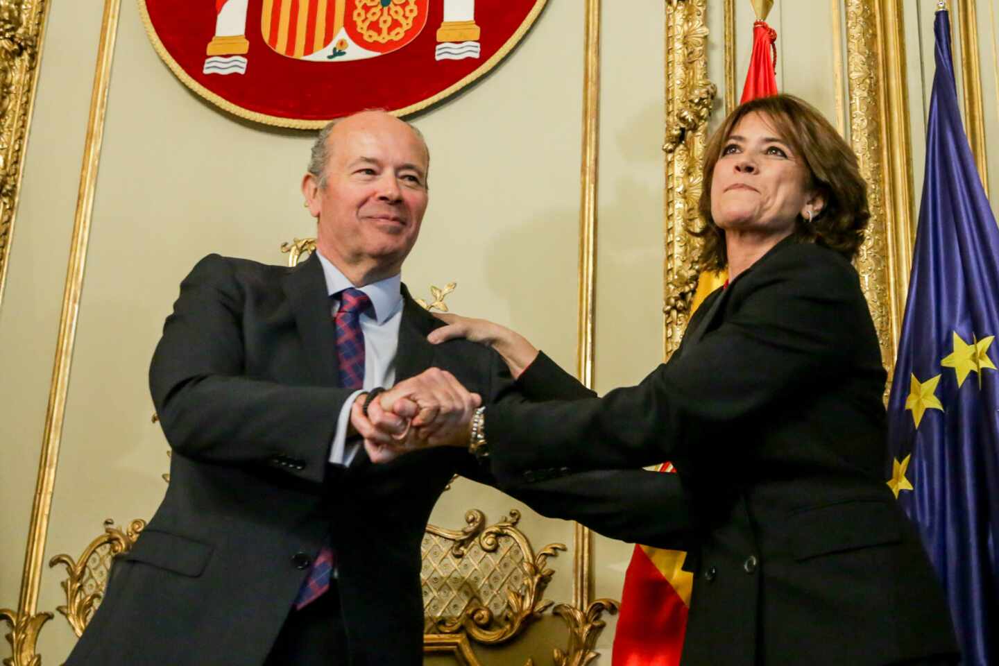El ministro Juan Carlos Campo y su antecesora en Justicia, Dolores Delgado (hoy fiscal general del Estado).