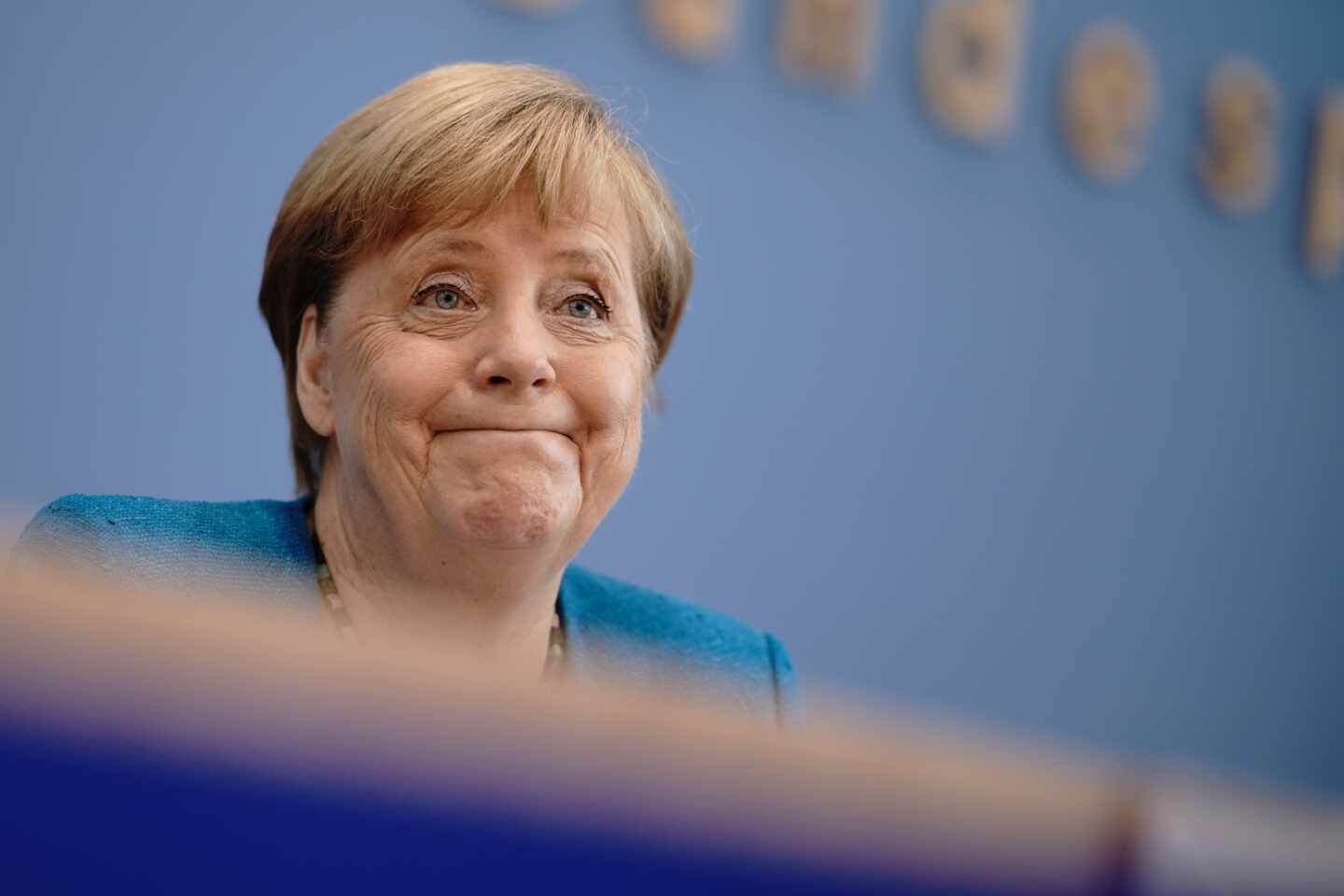 Merkel augura tiempos "aún más difíciles" en el otoño y en el invierno